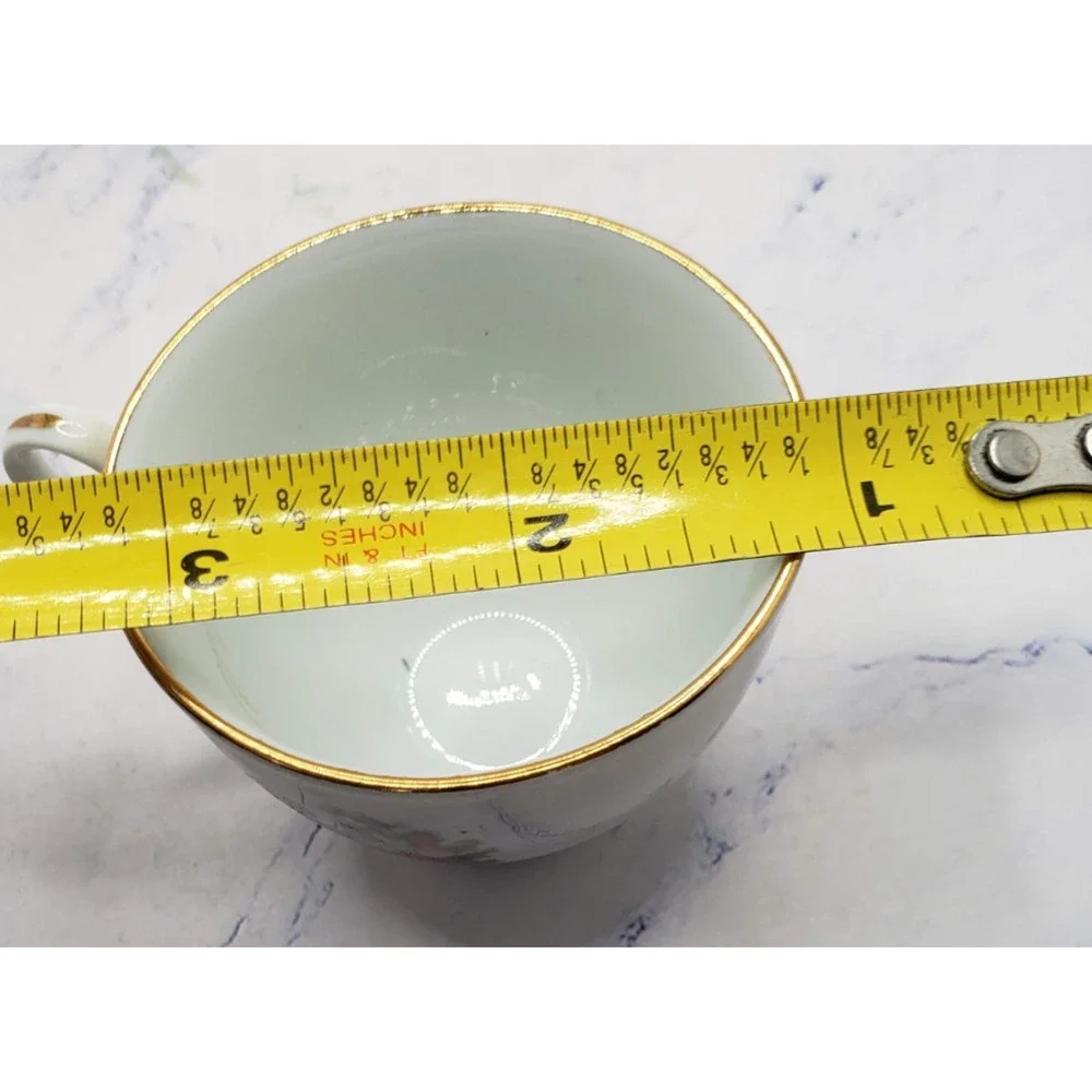 Vintage Porcelain Tea Cup and Saucer White w/Gold Trim and Dancing Couple